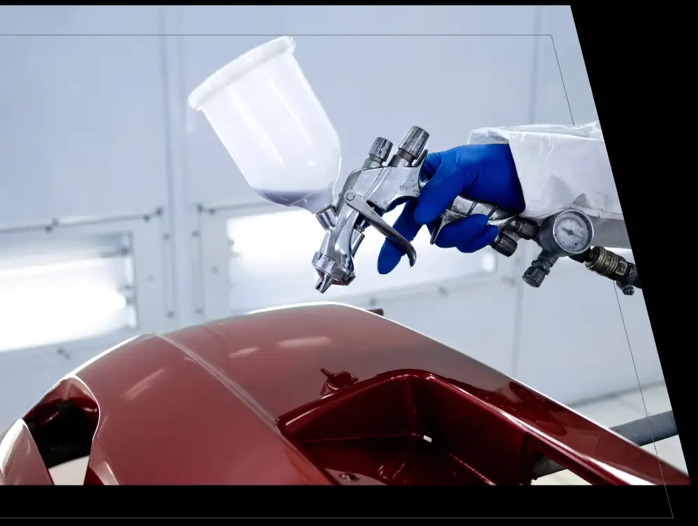 A vehicle panel being resprayed