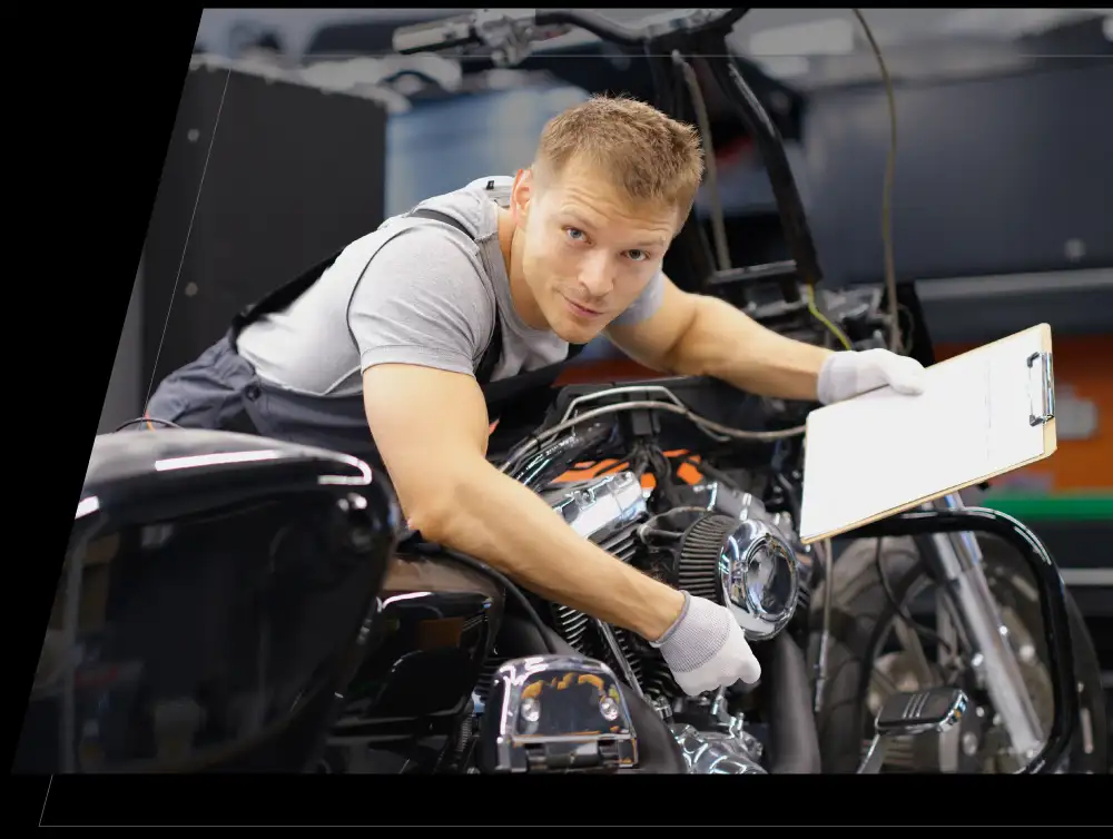 One of our team inspecting a motorbike